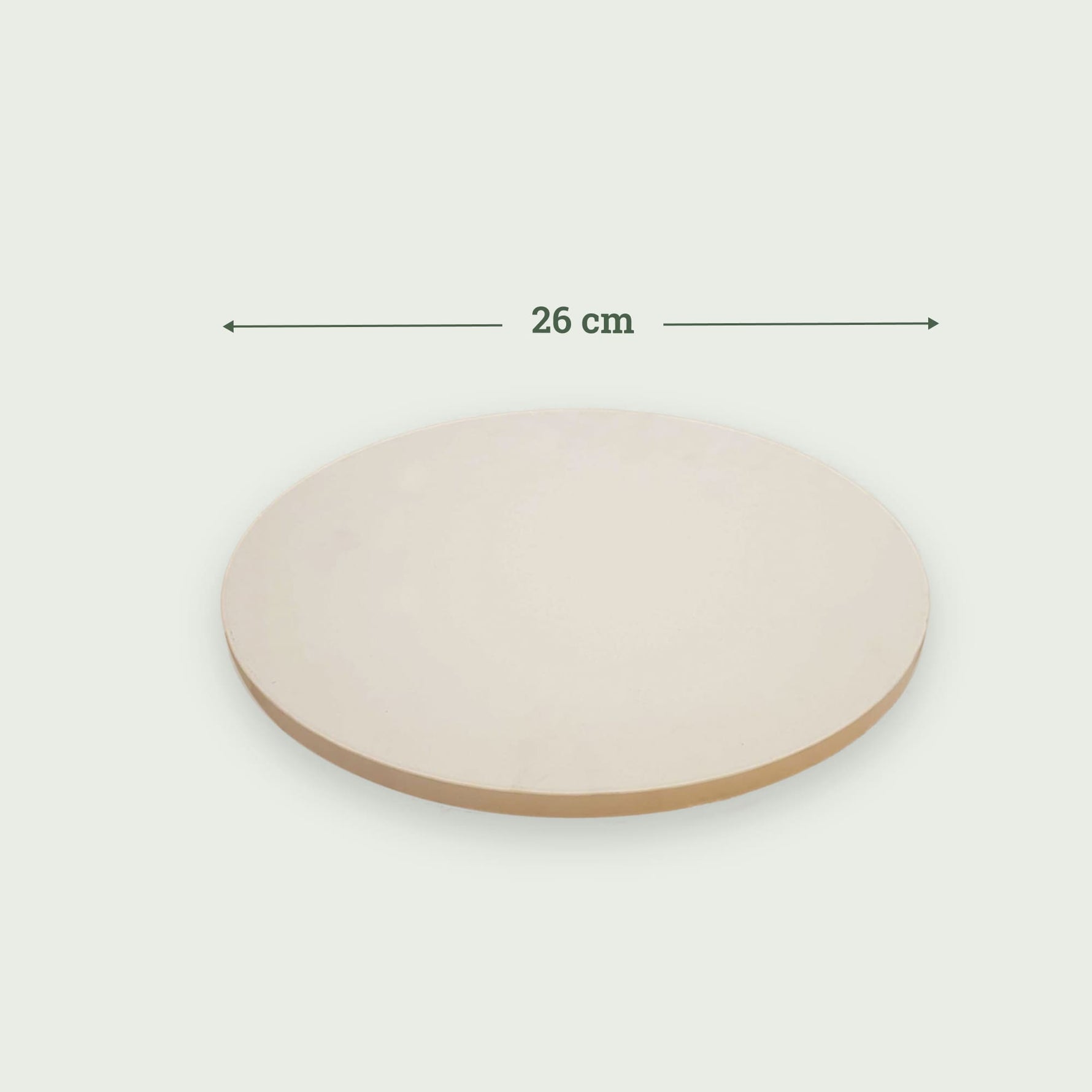Pierre à pizza ronde en céramique de 26 cm, vue de dessus avec indication de diamètre.
