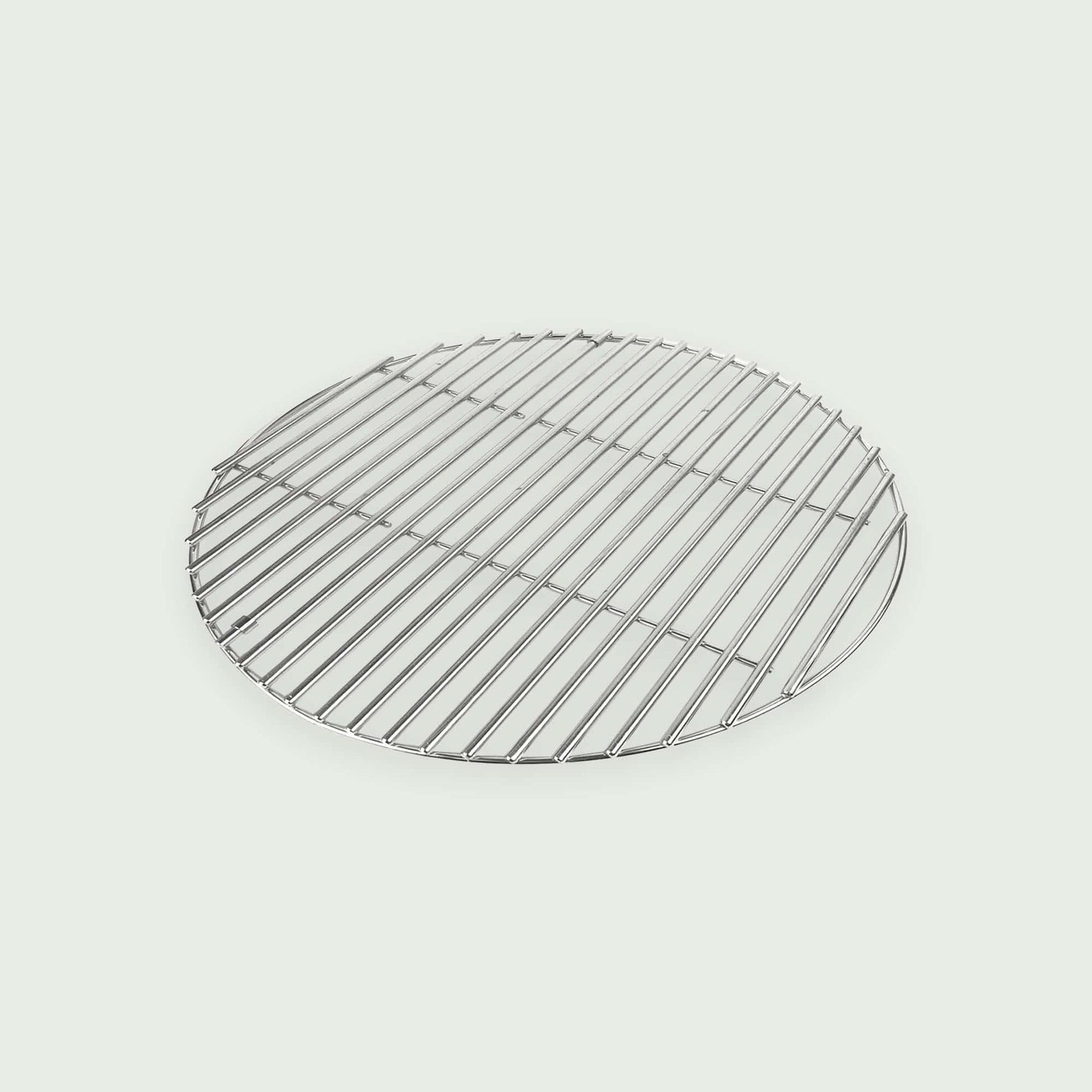 Grille de cuisson en acier inoxydable pour Kamado, résistante à la chaleur et facile à nettoyer, idéale pour griller viandes, poissons et légumes.
