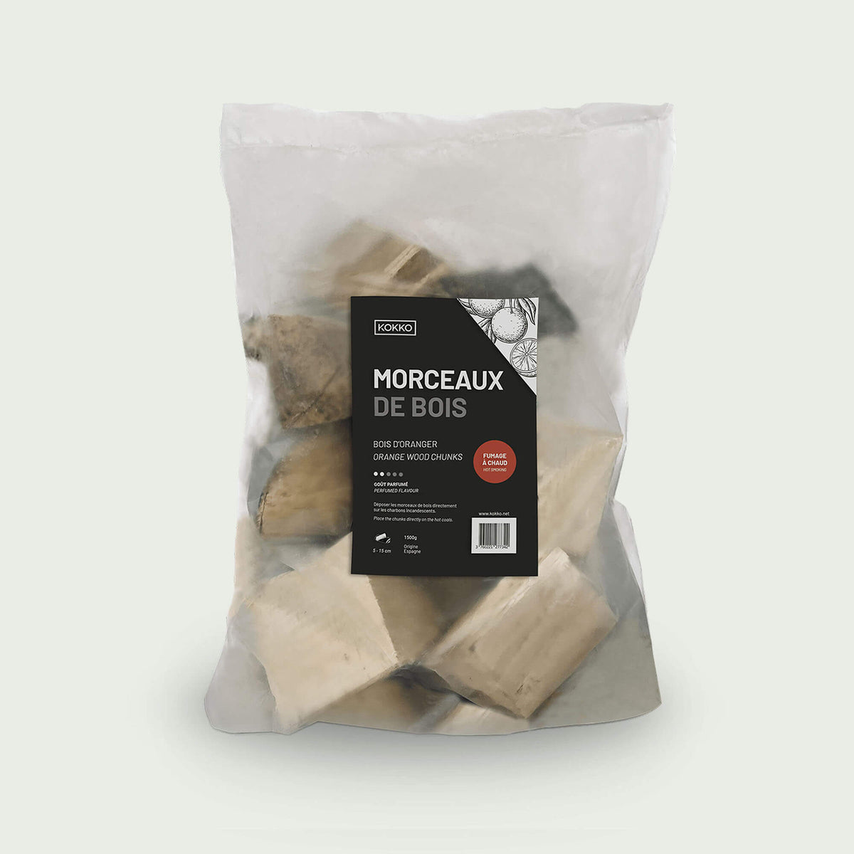 Sac transparent contenant des morceaux de bois d’oranger, avec étiquette noire, idéal pour le fumage et la cuisson à chaud au barbecue ou au Kamado.